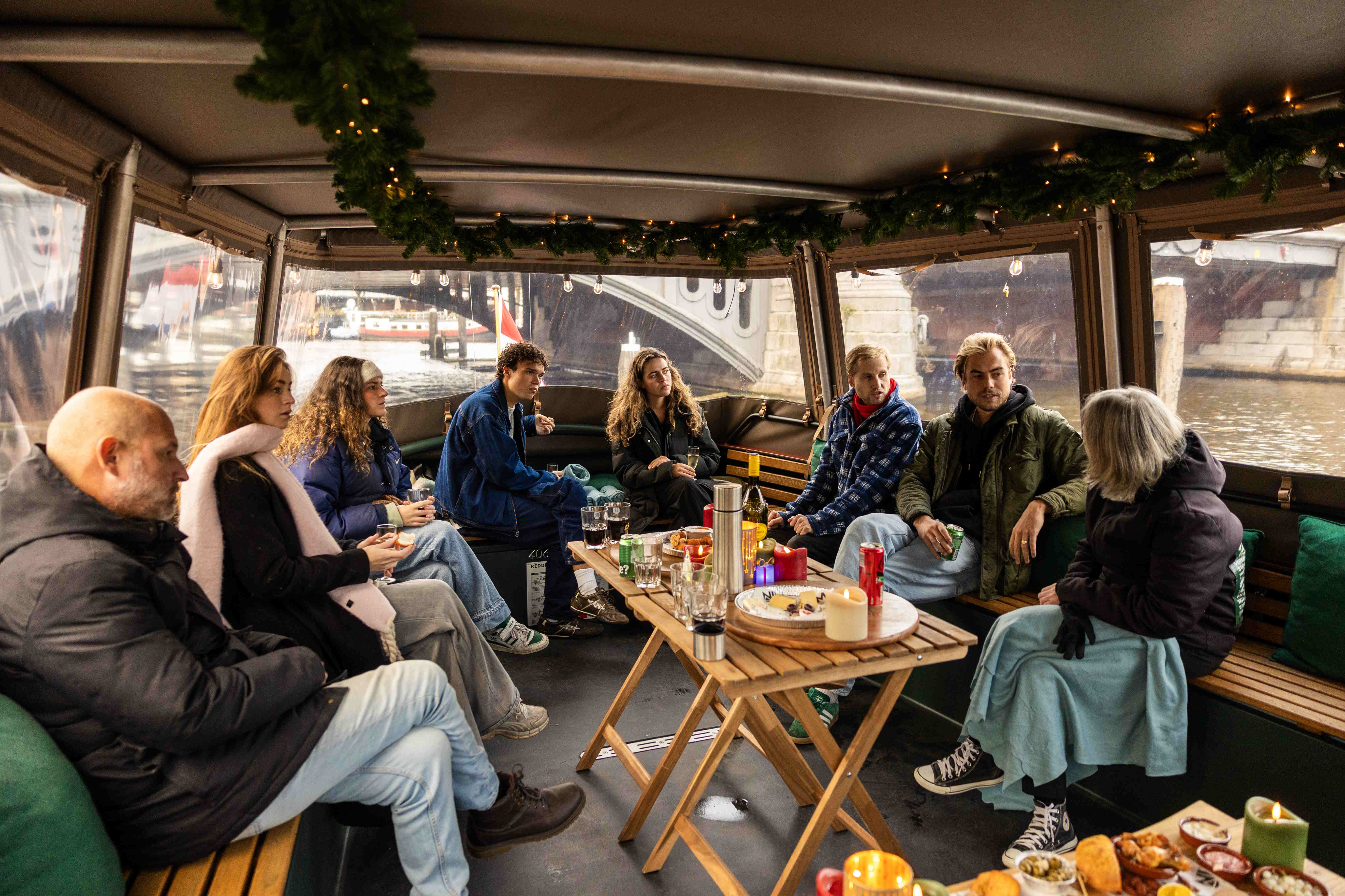 Mokum boat tug with canopy and people on board